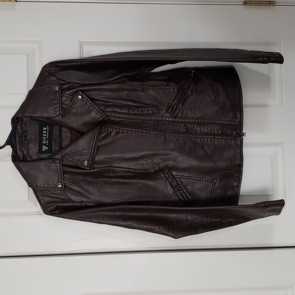 Rich chocolate brown pleather jacket with snake skin print.